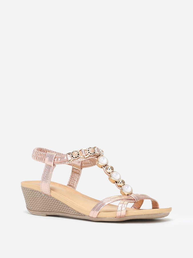 Sandales compensées rose doré à perles dorées