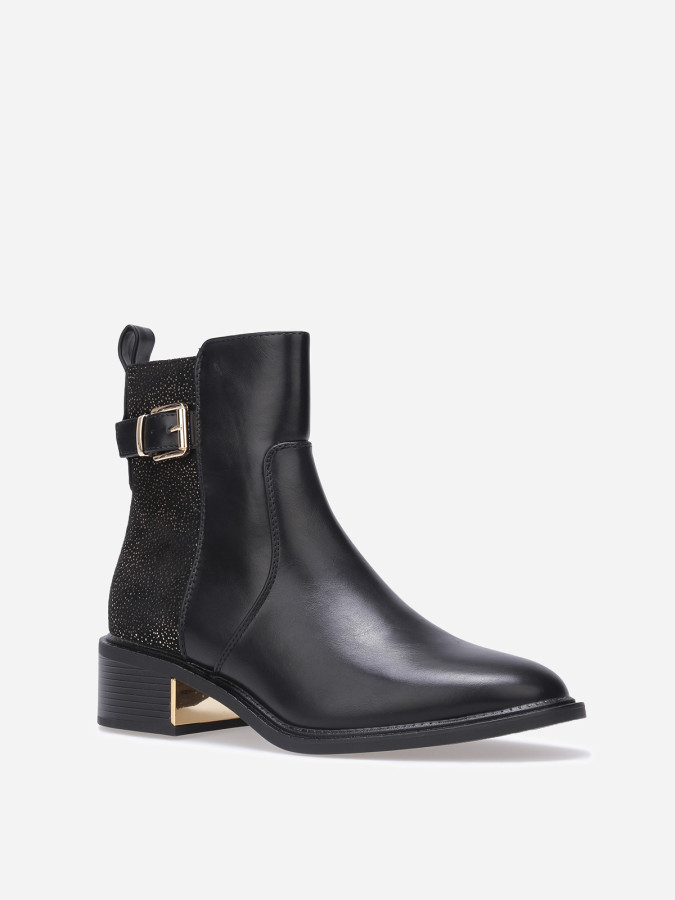 Bottines à motifs et détails dorés