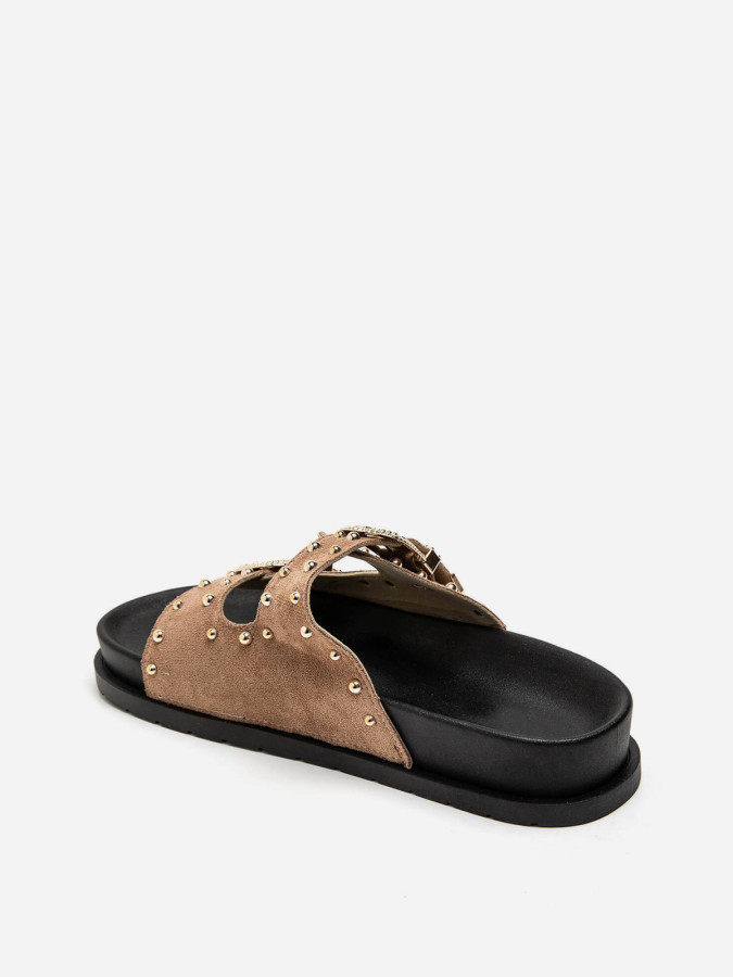Mules en suédine à boucles et clous dorés