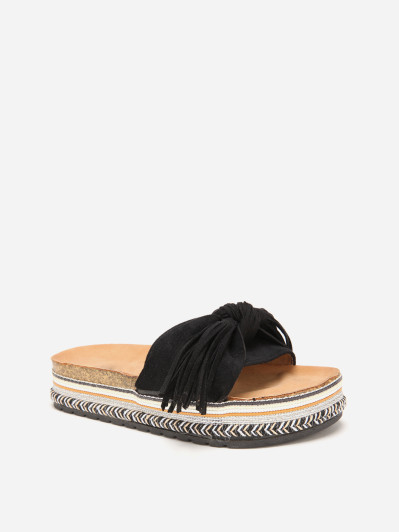 Mules noires à motif ethnique avec noeud et pompon