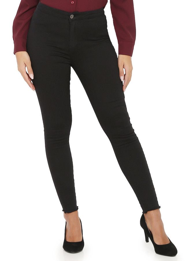 Jeans slim noir effiloché aux chevilles