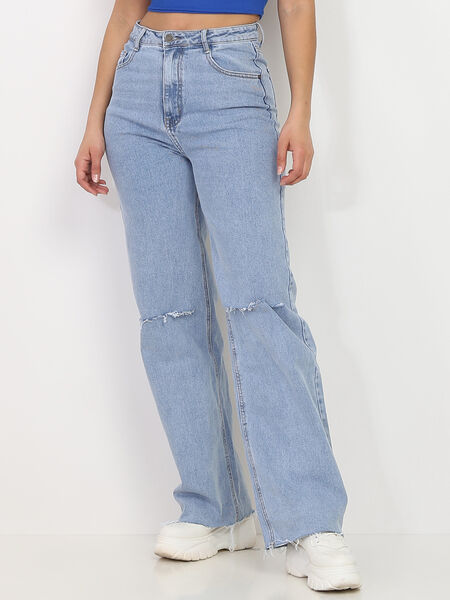 Jeans vintage strappati al ginocchio